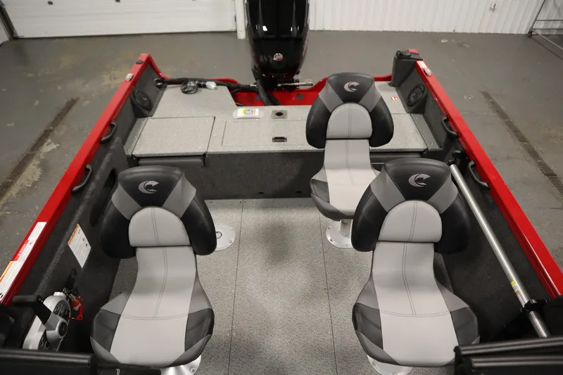 Slide: The Image of 2026 Crestliner 1750 Hawk Walkthrough boat interior with four seats and red accents. - 32