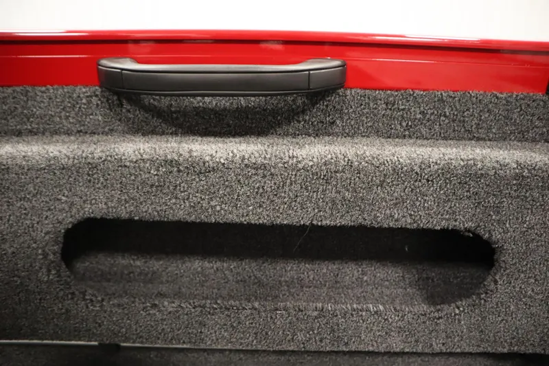 Slide: The Image of 2026 Crestliner 1750 Hawk Walkthrough interior detail with textured surface and handle. - 34