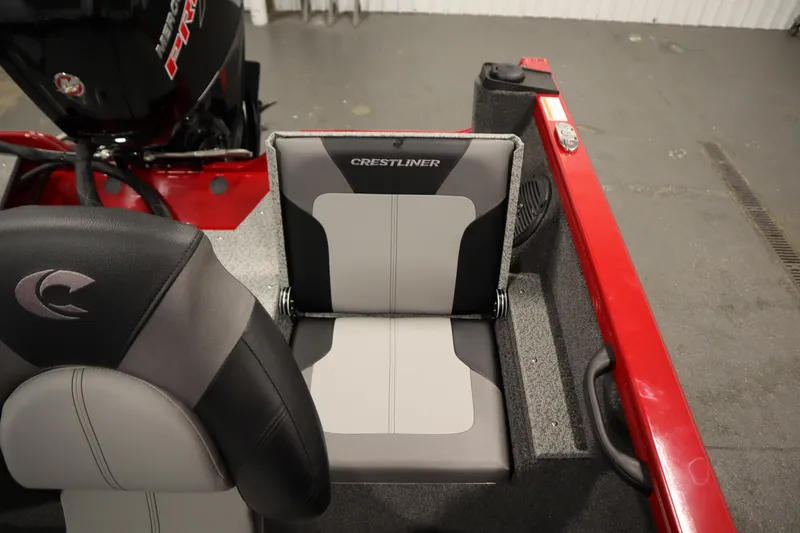 Slide: The Image of 2026 Crestliner 1750 Hawk Walkthrough boat seat, gray and black design, red accents. - 38