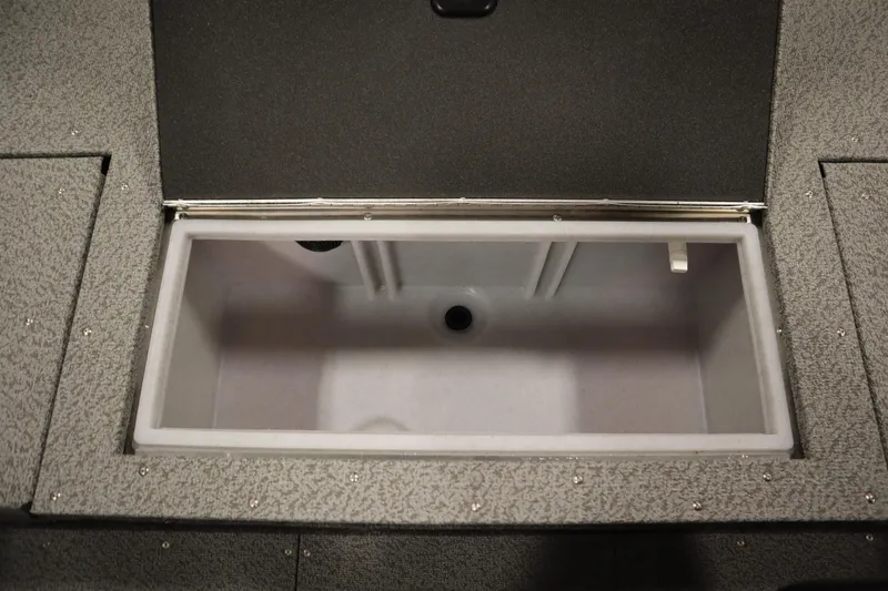 Slide: The Image of Livewell compartment in 2026 Crestliner 1750 Hawk Walkthrough boat, open lid view. - 40
