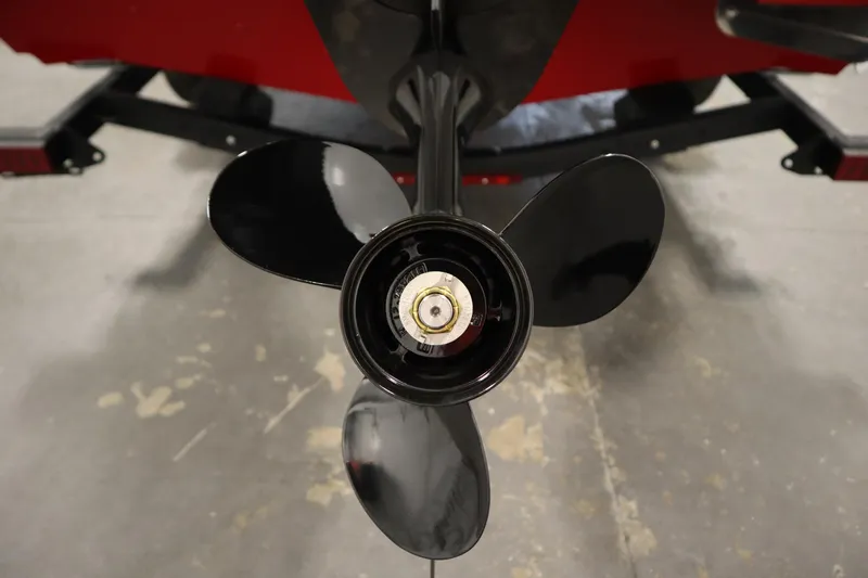 Slide: The Image of Propeller of 2026 Crestliner 1750 Hawk Walkthrough boat on display in a showroom. - 43