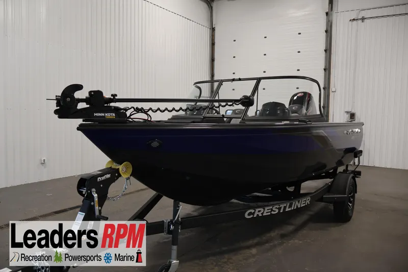 The Image of 2026 Crestliner 1750 Super Hawk boat in showroom, featuring Minn Kota trolling motor. - 0