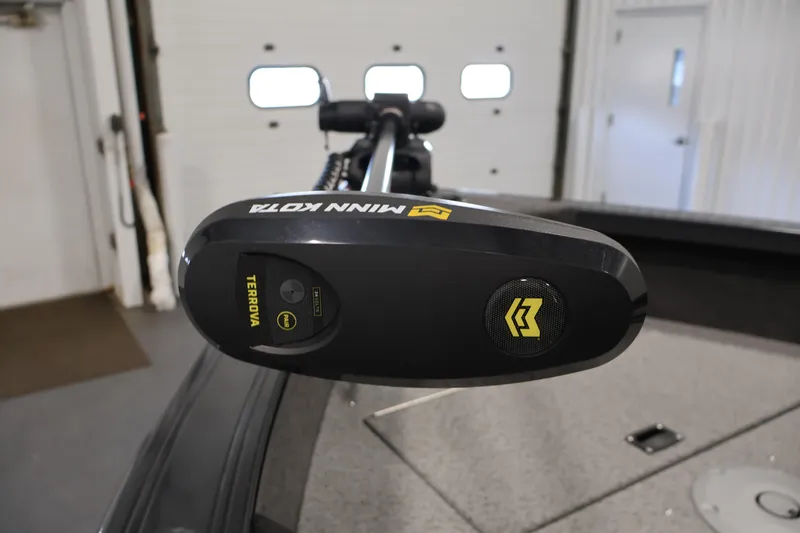 Slide: The Image of 2026 Crestliner 1750 Super Hawk boat interior with storage compartment and wiring. - 11