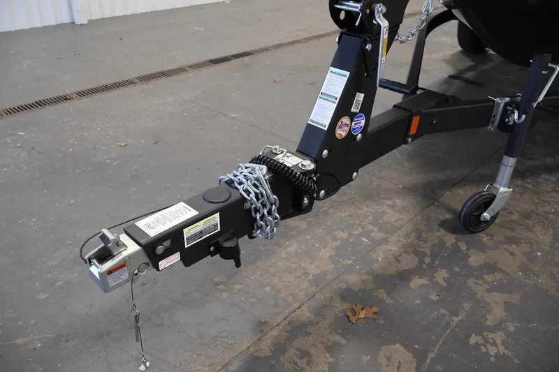 Slide: The Image of 2026 Crestliner 1750 Super Hawk boat's rear view with motor and seating area. - 30