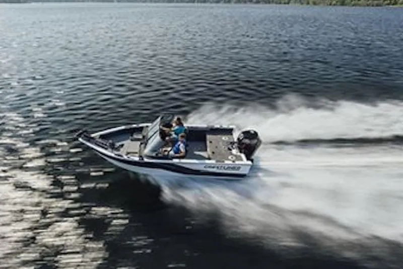 Slide: The Image of 2026 Crestliner 1750 Super Hawk speeding on a lake, showcasing performance and design. - 6