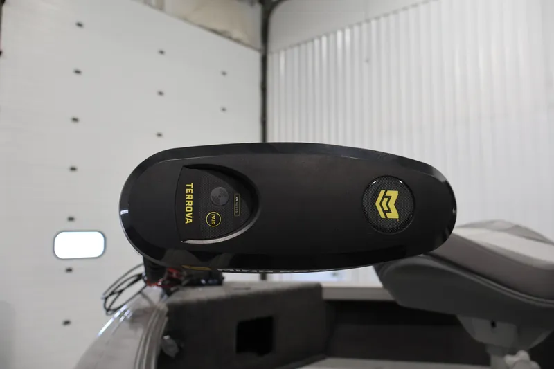 Slide: The Image of Close-up of Terrova motor on 2026 Crestliner 1850 Super Hawk boat in a garage. - 11