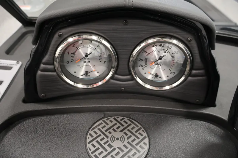 Slide: The Image of Dashboard of 2026 Crestliner 1850 Super Hawk with RPM and MPH gauges. - 18