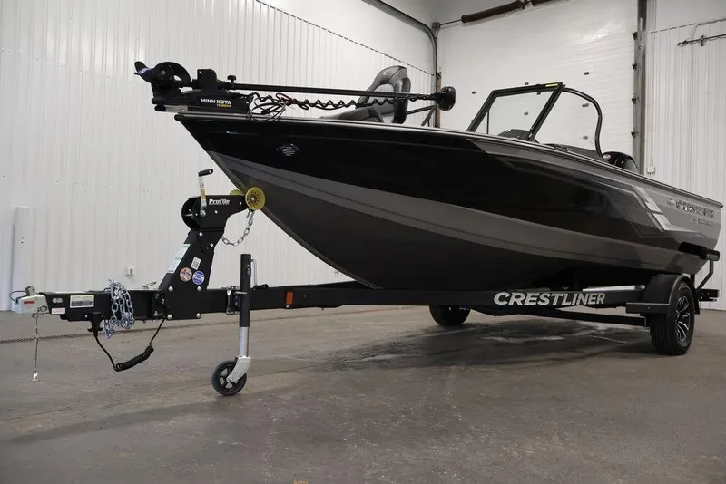 Slide: The Image of 2026 Crestliner 1850 Super Hawk boat on trailer in indoor setting. - 40