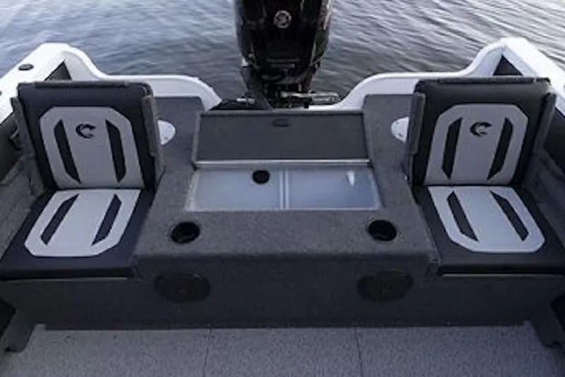 Slide: The Image of 2026 Crestliner 1850 Super Hawk boat interior with seating and storage compartments. - 41