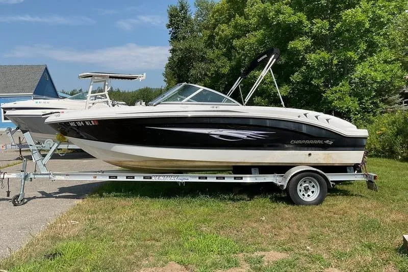 Slide: The Image of 2013 Chaparral H2O Fish & Ski boat on trailer, parked outdoors. - 4