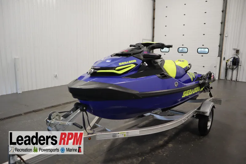 The Image of 2020 Sea-Doo Wake Pro 230 jet ski on trailer in indoor showroom. - 1