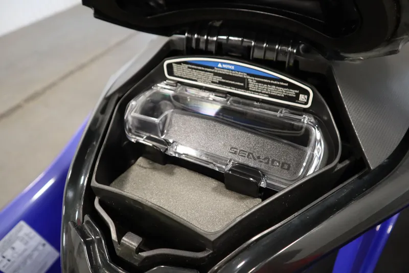 Slide: The Image of 2020 Sea-Doo Wake Pro 230 storage compartment, open view, showcasing interior details. - 17