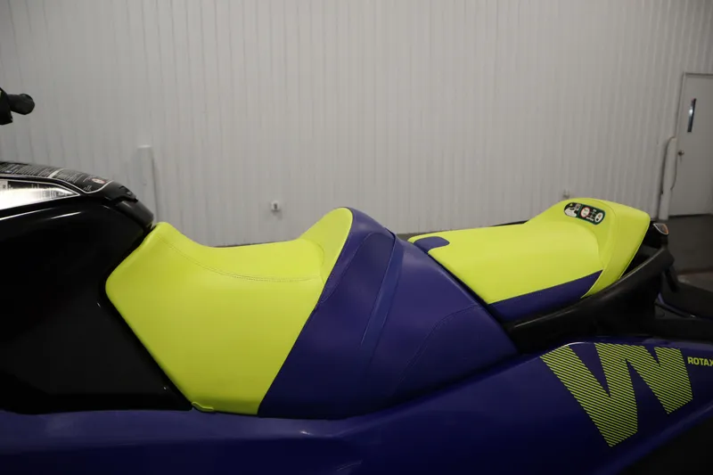 Slide: The Image of 2020 Sea-Doo Wake Pro 230 jet ski with vibrant yellow and blue seating. - 18
