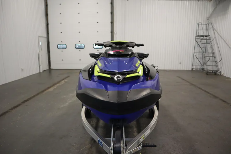 Slide: The Image of 2020 Sea-Doo Wake Pro 230 jet ski in a garage setting. - 2