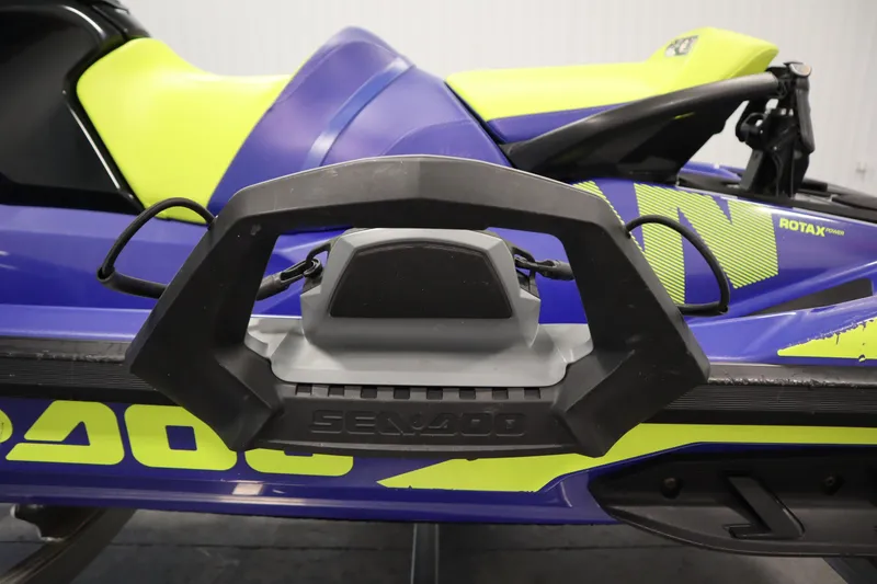 Slide: The Image of 2020 Sea-Doo Wake Pro 230 jet ski, close-up of handle and vibrant design. - 20