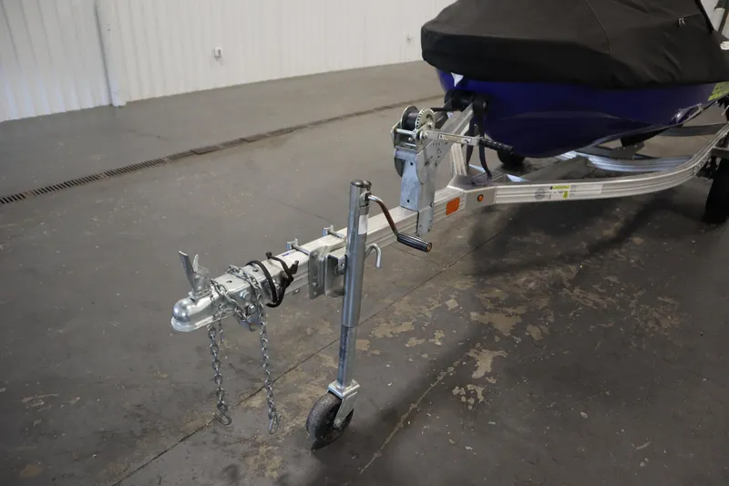 Slide: The Image of Trailer hitch of a 2020 Sea-Doo Wake Pro 230 in a garage setting. - 26