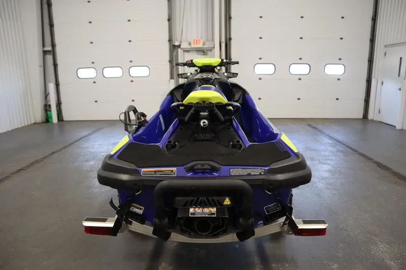 Slide: The Image of 2020 Sea-Doo Wake Pro 230 jet ski in a garage, rear view. - 6