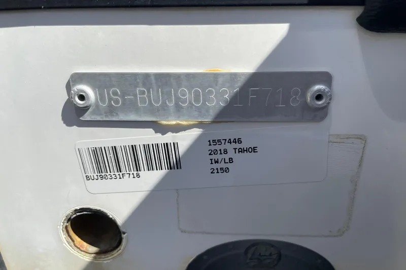 Slide: The Image of 2018 Tahoe 2150 identification plate with serial number and barcode. - 55