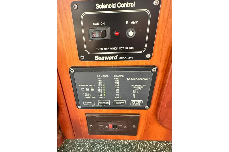 Slide: The Image of Control panel on 2000 Hinckley Picnic Boat 36, featuring solenoid and battery state indicators. - 21