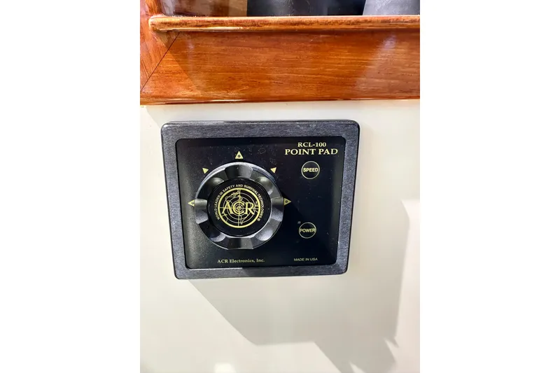 Slide: The Image of ACR Electronics RCL-100 Point Pad on 2000 Hinckley Picnic Boat 36. - 34