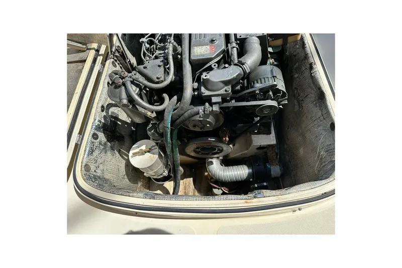 Slide: The Image of Engine compartment of a 2000 Hinckley Picnic Boat 36, showcasing mechanical components. - 37