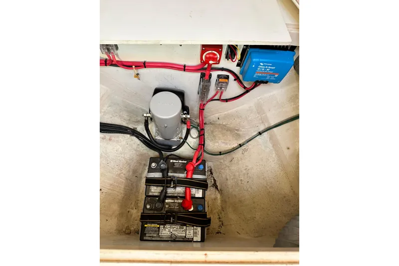Slide: The Image of Electrical system of a 2000 Hinckley Picnic Boat 36, featuring battery and wiring components. - 39