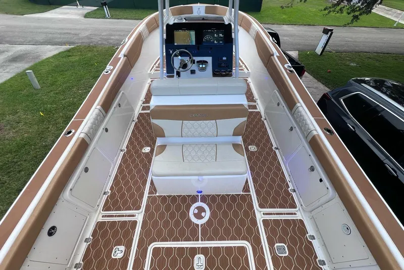 Slide: The Image of 2019 Century 3200 Center Console boat with spacious deck and modern controls. - 6