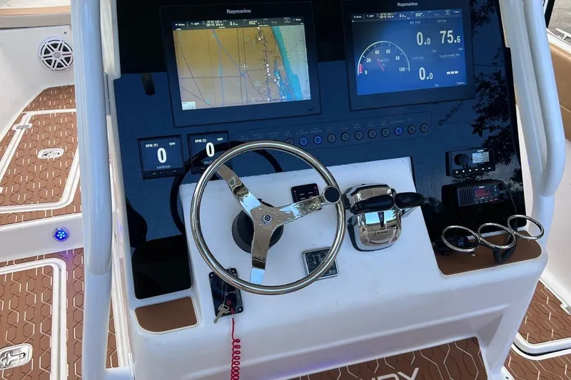 Slide: The Image of Century 3200 Center Console 2019 dashboard with navigation screens and steering wheel. - 8