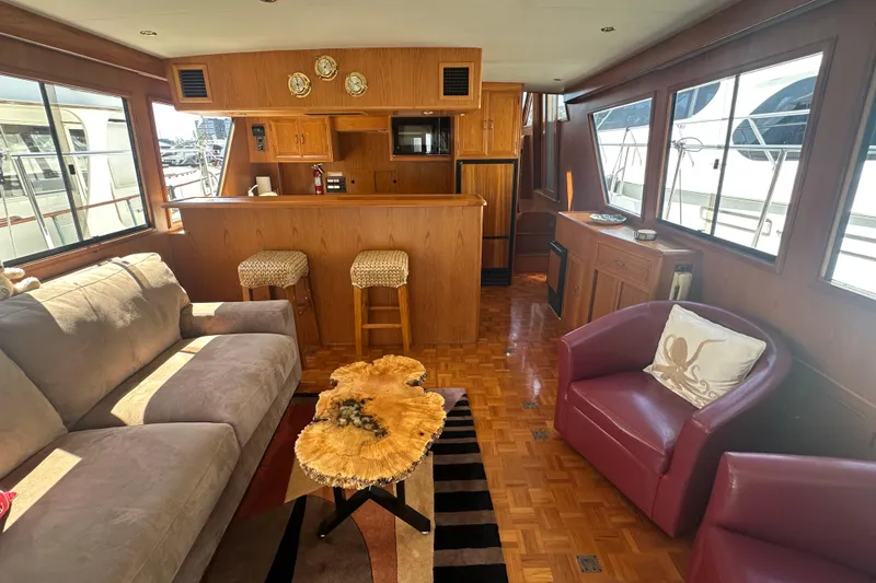 Slide: The Image of Luxurious interior of 1995 Ocean Alexander 486 Classicco Pilothouse yacht with elegant furnishings. - 18