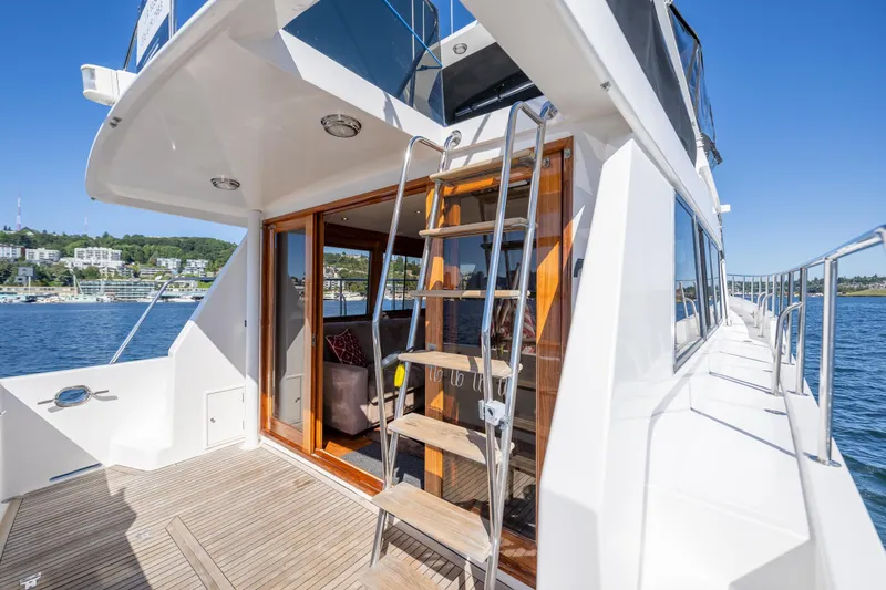 Slide: The Image of 1995 Ocean Alexander 486 Classicco Pilothouse yacht with wooden deck and ladder, on Lake Union. - 26