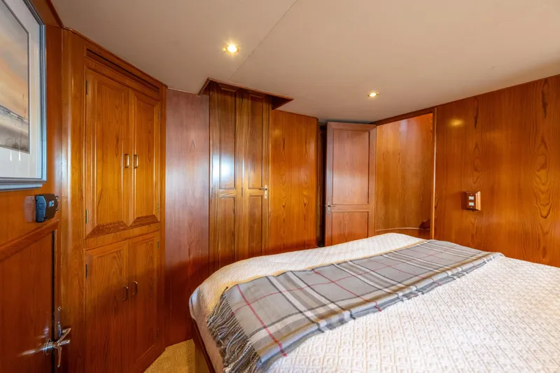 Slide: The Image of Luxurious wooden interior of 1995 Ocean Alexander 486 Classicco Pilothouse bedroom. - 33