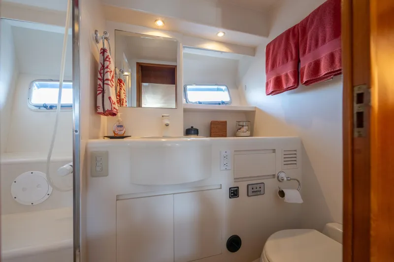 Slide: The Image of Bathroom interior of 1995 Ocean Alexander 486 Classicco Pilothouse yacht, featuring modern amenities. - 34