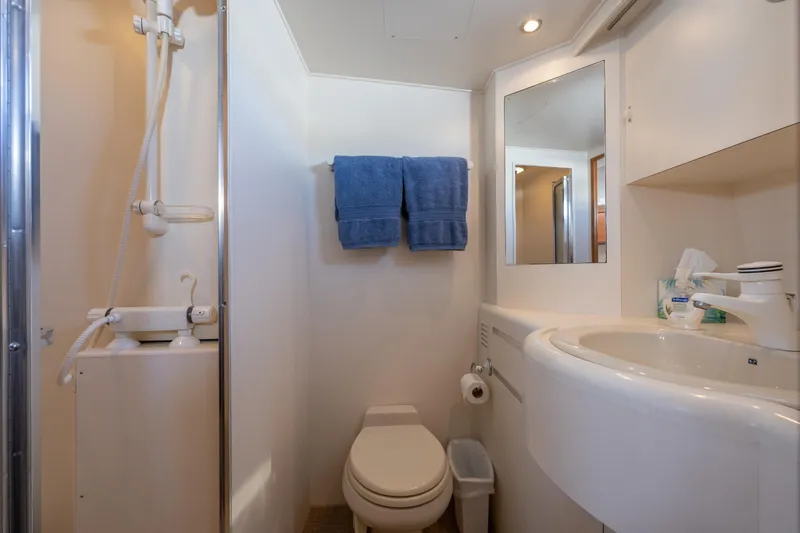 Slide: The Image of Bathroom of 1995 Ocean Alexander 486 Classicco Pilothouse with shower, sink, and toilet. - 38