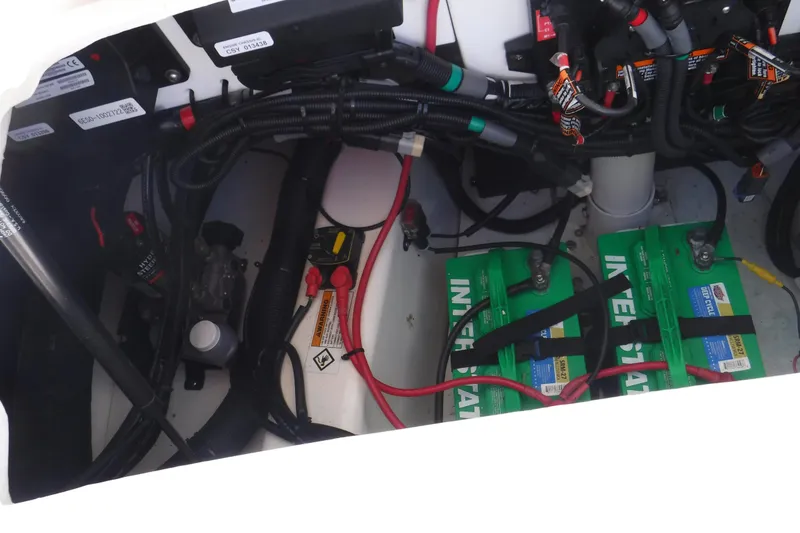 Slide: The Image of Engine compartment of 2015 Zodiac 28 Pro Optimum with batteries and wiring. - 10