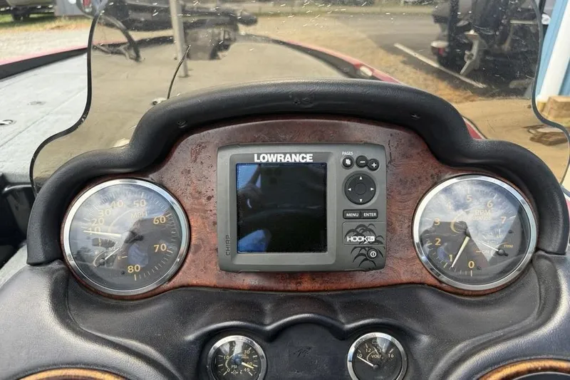 Slide: The Image of Dashboard of a 2005 Triton TR 19 X boat with Lowrance GPS and gauges. - 14