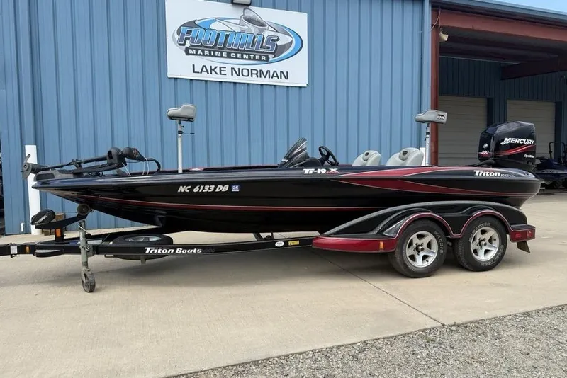 Slide: The Image of 2005 Triton TR 19 X boat on trailer at Foothills Marine Center, Lake Norman. - 2