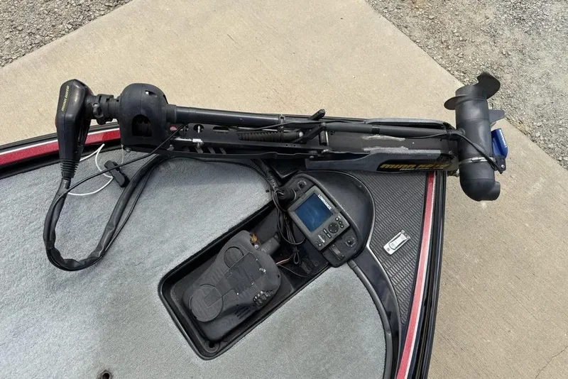 Slide: The Image of Triton TR 19 X 2005 boat with trolling motor and fish finder on deck. - 5