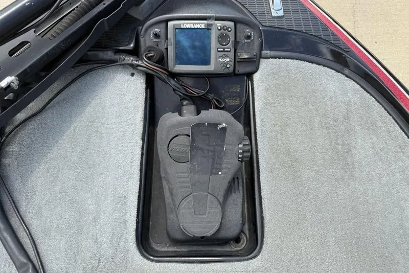 Slide: The Image of Foot pedal and Lowrance fishfinder on 2005 Triton TR 19 X boat. - 9