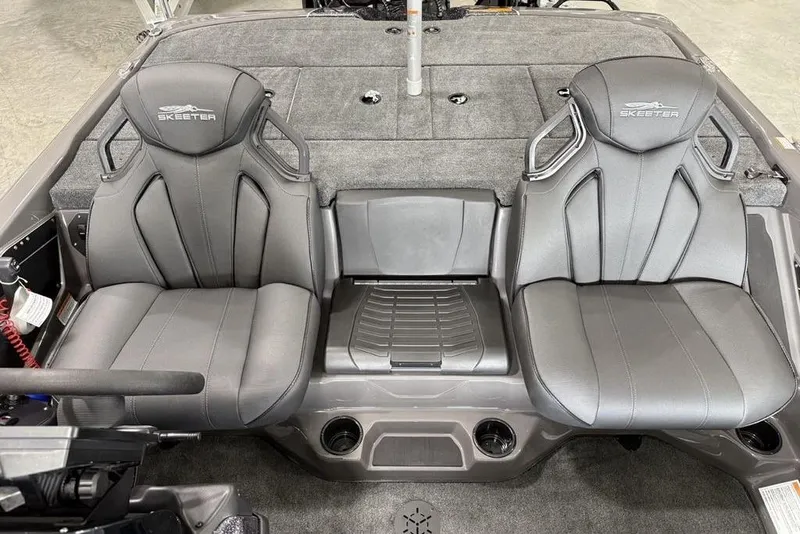 Slide: The Image of 2025 Skeeter ZXR20 boat interior with two sleek, gray seats and storage compartments. - 13