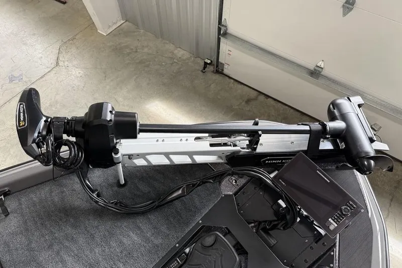 Slide: The Image of 2025 Skeeter ZXR20 boat with Minn Kota trolling motor and control panel. - 4