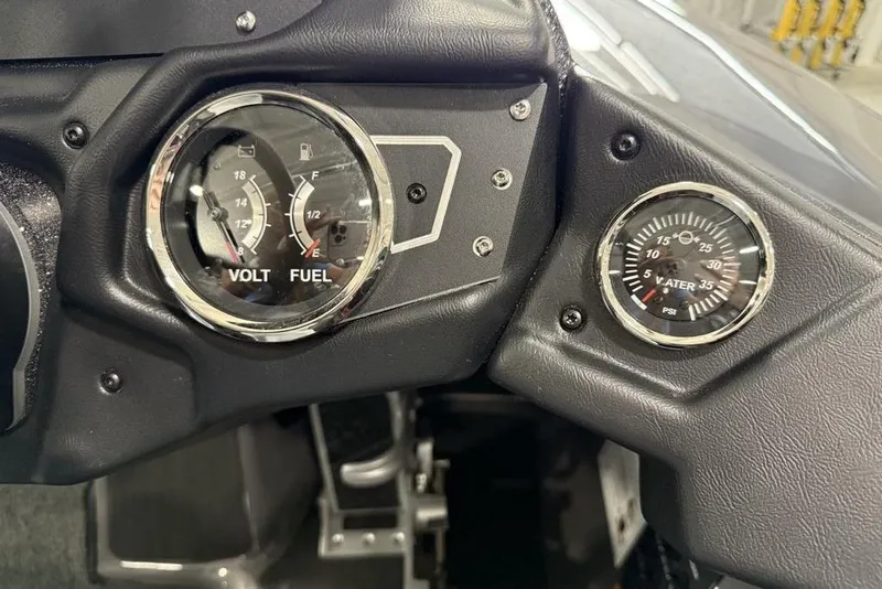 Slide: The Image of Dashboard of 2025 Skeeter ZXR20 showing volt, fuel, and water pressure gauges. - 9