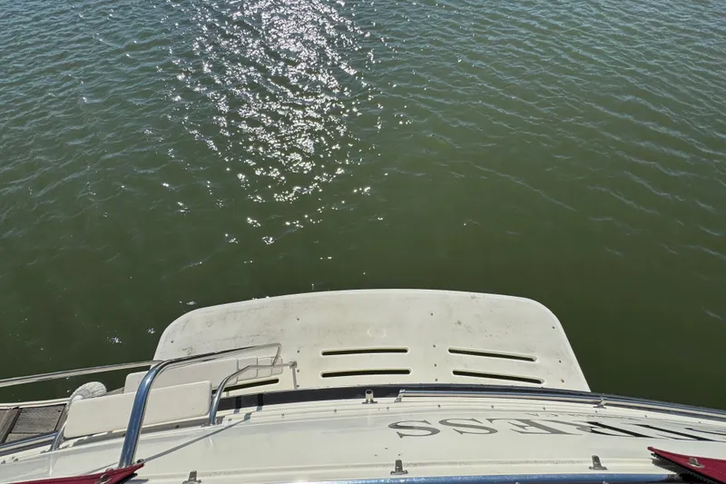 Slide: The Image of Aerial view of 1986 Californian 42 yacht stern on shimmering water. - 46