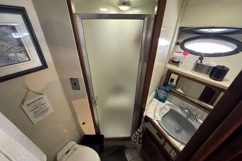 Slide: The Image of Bathroom interior of a 1986 Californian 42 yacht with shower and sink. - 9