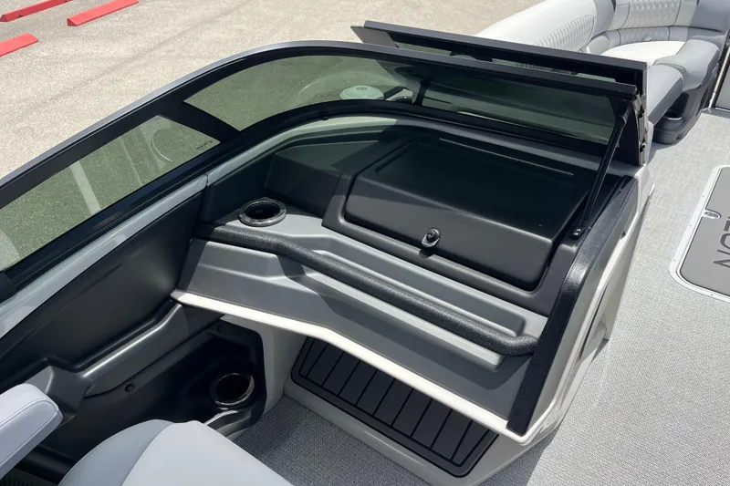 Slide: The Image of Interior of 2026 Avalon 2785 Excalibur LTD boat with windshield and seating area. - 14