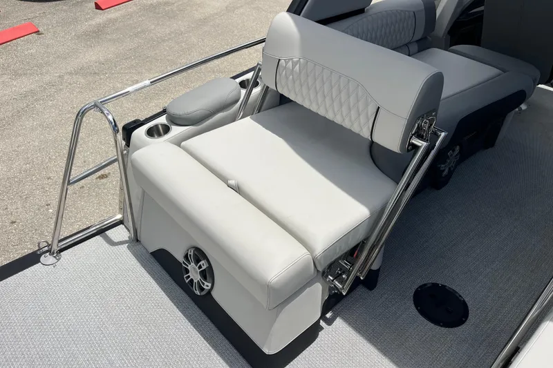 Slide: The Image of Luxurious seating on 2026 Avalon 2785 Excalibur LTD boat with elegant upholstery and cup holder. - 23