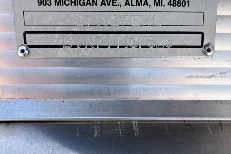 Slide: The Image of Close-up of Avalon 2785 Excalibur LTD identification plate, featuring serial numbers and address details. - 24