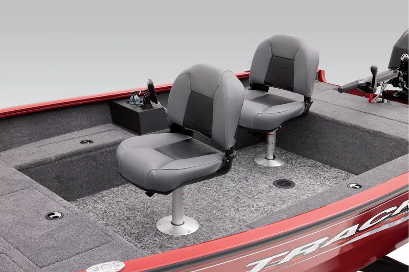 Slide: The Image of Manufacturer Provided Image: 2025 Tracker Super Guide V-16 T boat interior with two gray seats and red trim. - 11