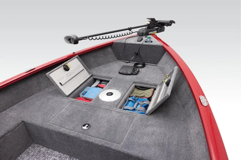 Slide: The Image of Manufacturer Provided Image: 2025 Tracker Super Guide V-16 T boat interior with storage compartments and trolling motor. - 9