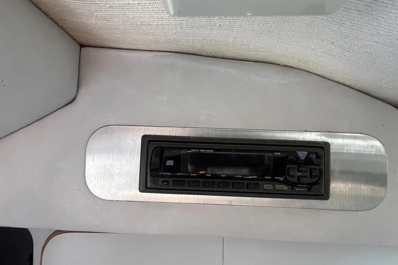 Slide: The Image of 1991 Sea Ray 300 Weekender interior with Kenwood stereo system. - 21