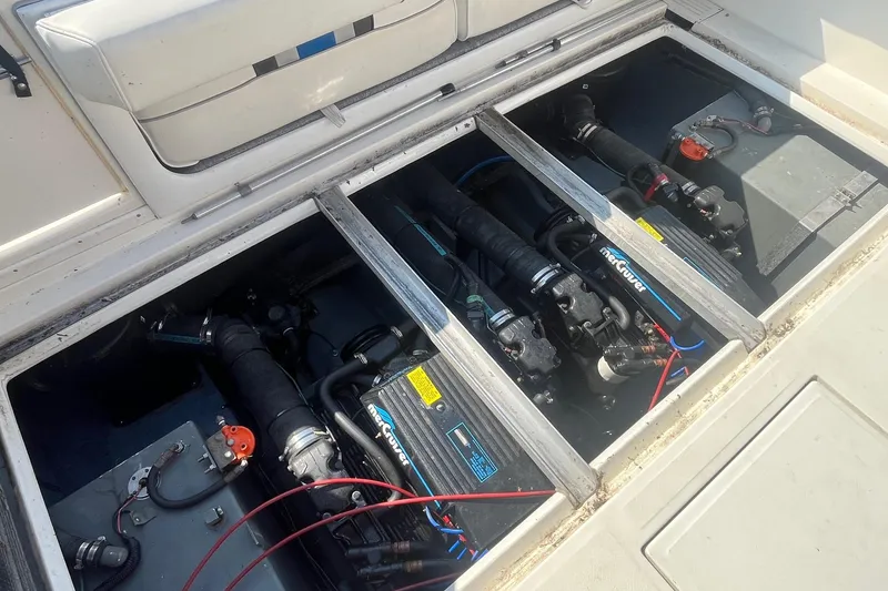 Slide: The Image of Engine compartment of a 1991 Sea Ray 300 Weekender boat with MerCruiser engines. - 25